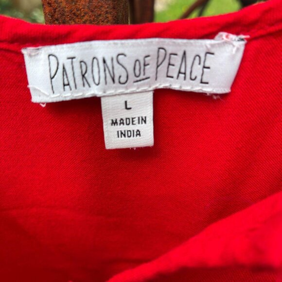 large tomato red top with tiered flounce! Also braided straps, so cute! - Picture 2 of 2